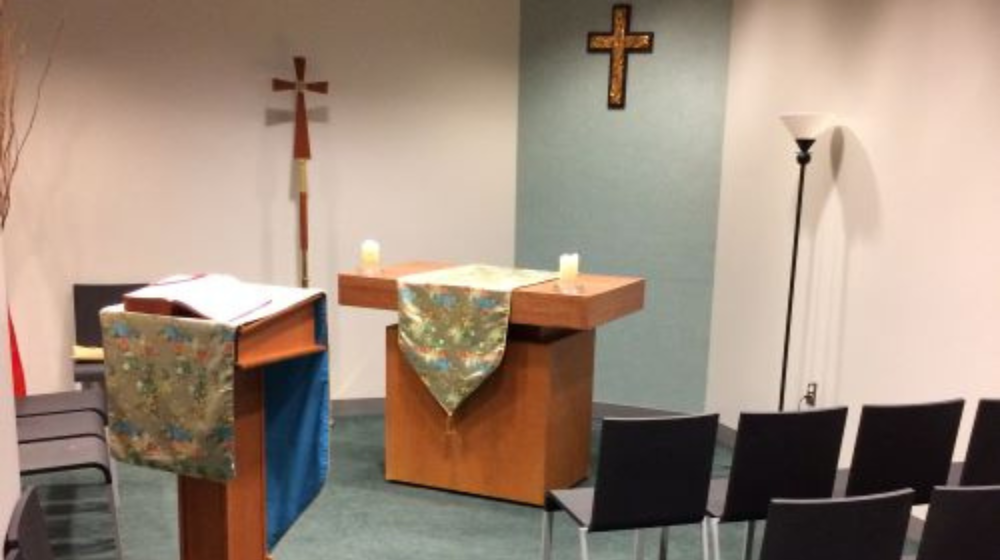 The altar space in HSC Ministry's Gathering Room, Cuneo Center room 250.